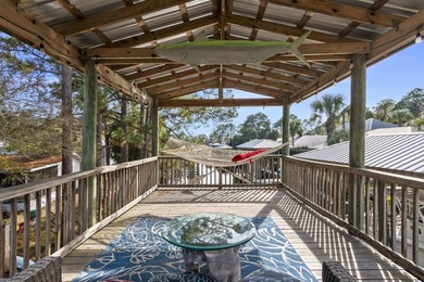Step into this canal-front property with direct access to Buck - photo 36