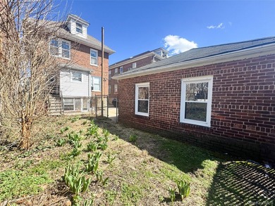 Welcome to 2021 Haight Avenue, a detached brick two family home - photo 23