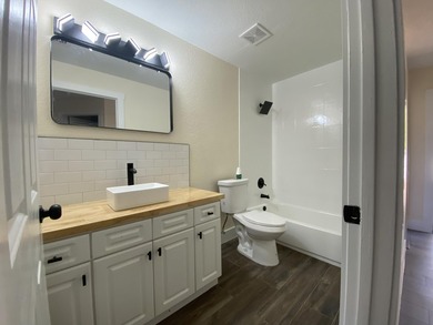 AVAILABLE FOR IMMEDIATE SALE - Updated 4-bedroom, 2-bath - photo 6
