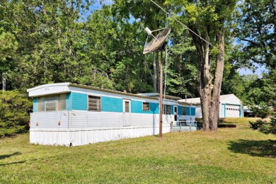 Recreational property in Lackie's Birch Haven!  Discover this - Lake Home For Sale in Mecosta, Michigan