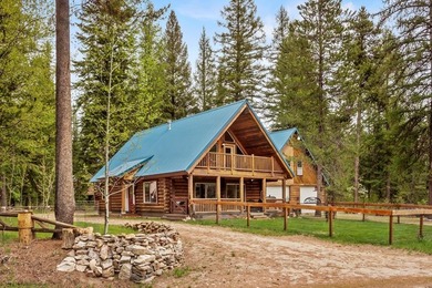 WELL MAINTAINED LOG HOME CLOSE TO LAKE! Two forested lots - photo 1