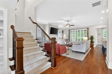 Nestled within the prestigious River District, a coveted gated - photo 12