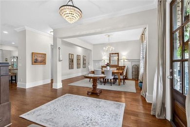 Nestled within the prestigious River District, a coveted gated - photo 15