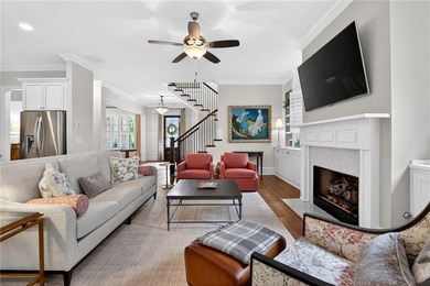 Nestled within the prestigious River District, a coveted gated - photo 17
