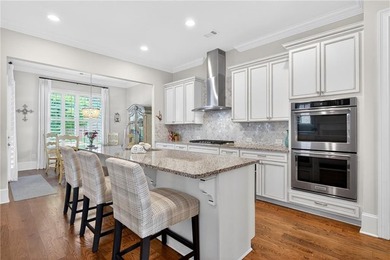 Nestled within the prestigious River District, a coveted gated - photo 21