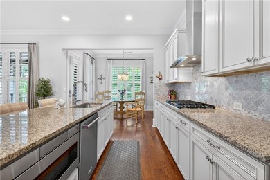 Nestled within the prestigious River District, a coveted gated - photo 22