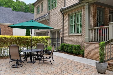 Nestled within the prestigious River District, a coveted gated - photo 48
