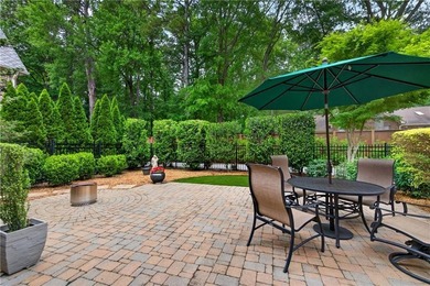 Nestled within the prestigious River District, a coveted gated - photo 49