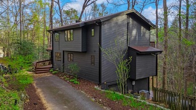 Tucked away on a peaceful cove of Lake Hiwassee in the - photo 2