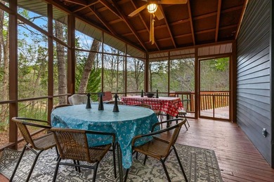 Tucked away on a peaceful cove of Lake Hiwassee in the - photo 6