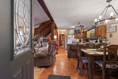 Tucked away on a peaceful cove of Lake Hiwassee in the - photo 10