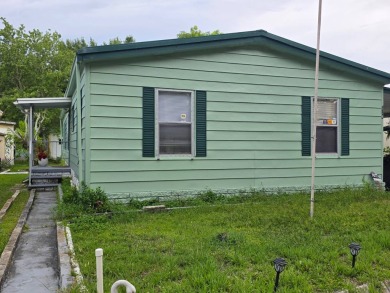 226 Palm Dr, Tampa FL 33613 - 55+ Rose Lake Estates 1,344 sq ft - photo 3