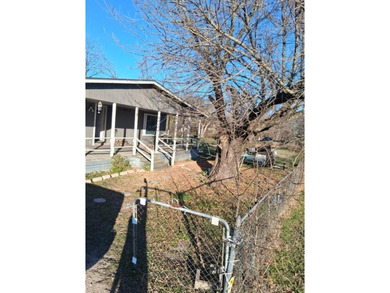 Half acre of land and doublewide situated on three lots totaling - photo 5