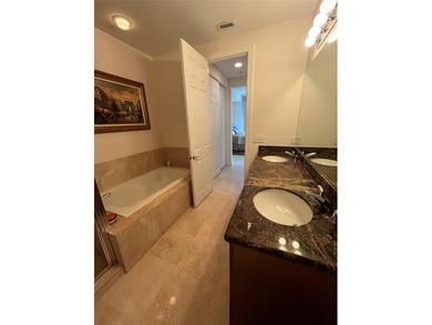 This rarely available large corner townhouse has 3 bedroom 3.5 - photo 16