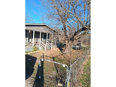 Half acre of land and doublewide situated on three lots totaling - photo 8