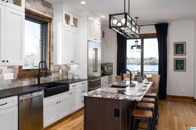CUSTOM-BUILT NEW home with 165' of PRIVATE LAKEFRONT and - photo 21