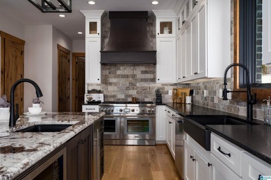 CUSTOM-BUILT NEW home with 165' of PRIVATE LAKEFRONT and - photo 24