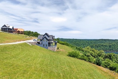 Located in The Pointe at Dale Hollow Lake, a prestigious gated - photo 3