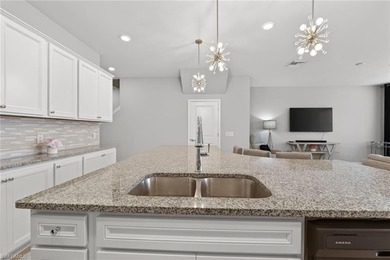 Welcome to this exceptional 3-bedroom, 2.5-bath lakeview