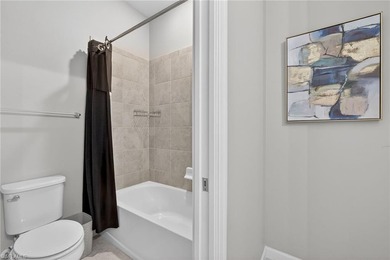 Welcome to this exceptional 3-bedroom, 2.5-bath lakeview