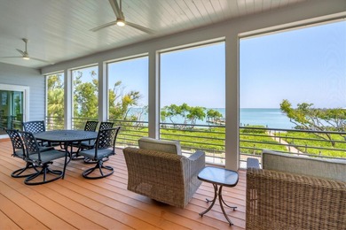 Welcome to 19 Grouper Hole Drive, a captivating waterfront - photo 5