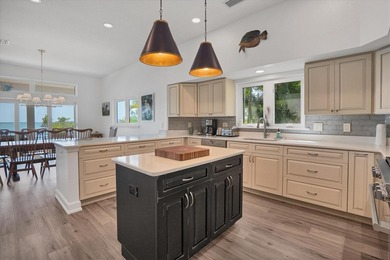 Welcome to 19 Grouper Hole Drive, a captivating waterfront - photo 8