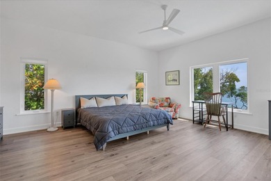 Welcome to 19 Grouper Hole Drive, a captivating waterfront - photo 13