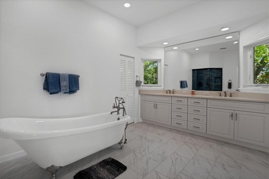Welcome to 19 Grouper Hole Drive, a captivating waterfront - photo 15