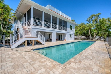 Welcome to 19 Grouper Hole Drive, a captivating waterfront - photo 34