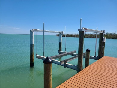 Welcome to 19 Grouper Hole Drive, a captivating waterfront - photo 41