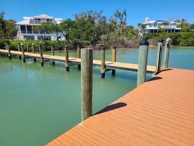 Welcome to 19 Grouper Hole Drive, a captivating waterfront - photo 43