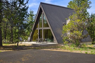 Situated on a rare and wooded 0.81-acre lot in Donnelly, only 10 - photo 1