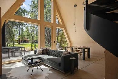 Situated on a rare and wooded 0.81-acre lot in Donnelly, only 10 - photo 2