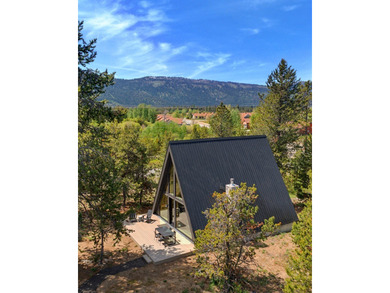 Situated on a rare and wooded 0.81-acre lot in Donnelly, only 10 - photo 3