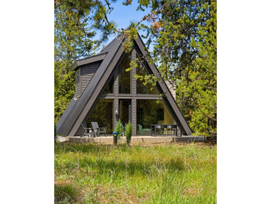 Situated on a rare and wooded 0.81-acre lot in Donnelly, only 10 - photo 4