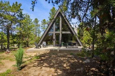 Situated on a rare and wooded 0.81-acre lot in Donnelly, only 10 - photo 5
