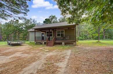 Beautiful retreat with open acreage mixed with wooded areasing - photo 33