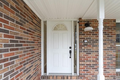 Welcome home to this well-maintained, tastefully updated brick - photo 3