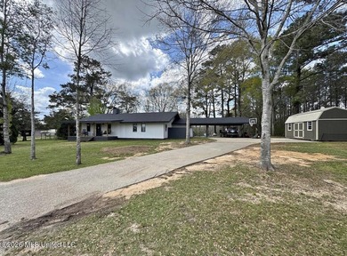 Welcome to this charming 3-bedroom, 2-bath farmhouse retreat - photo 1