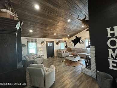 Welcome to this charming 3-bedroom, 2-bath farmhouse retreat - photo 4
