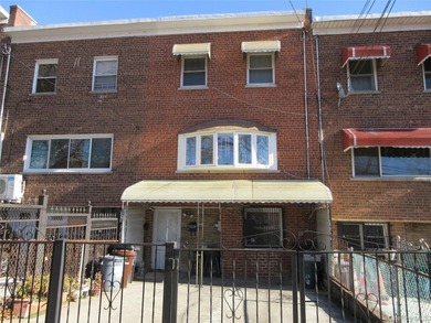 Well-maintained attached brick single- family home located in - photo 1
