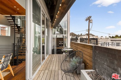 Ocean views abound from this architectural statement in the - photo 10