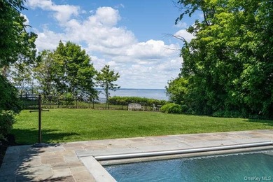 Welcome to 7 Cedar Lane, a remarkable turnkey residence perched - photo 12