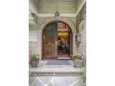 Welcome to 7 Cedar Lane, a remarkable turnkey residence perched - photo 15