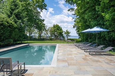 Welcome to 7 Cedar Lane, a remarkable turnkey residence perched - photo 17