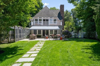 Welcome to 7 Cedar Lane, a remarkable turnkey residence perched - photo 18