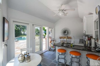 Welcome to 7 Cedar Lane, a remarkable turnkey residence perched - photo 22