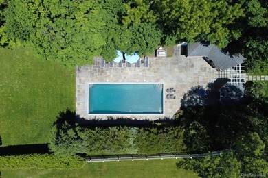 Welcome to 7 Cedar Lane, a remarkable turnkey residence perched - photo 24