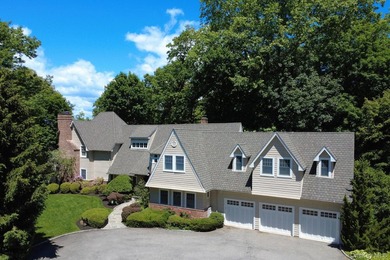 Welcome to 7 Cedar Lane, a remarkable turnkey residence perched - photo 26