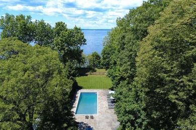 Welcome to 7 Cedar Lane, a remarkable turnkey residence perched - photo 29